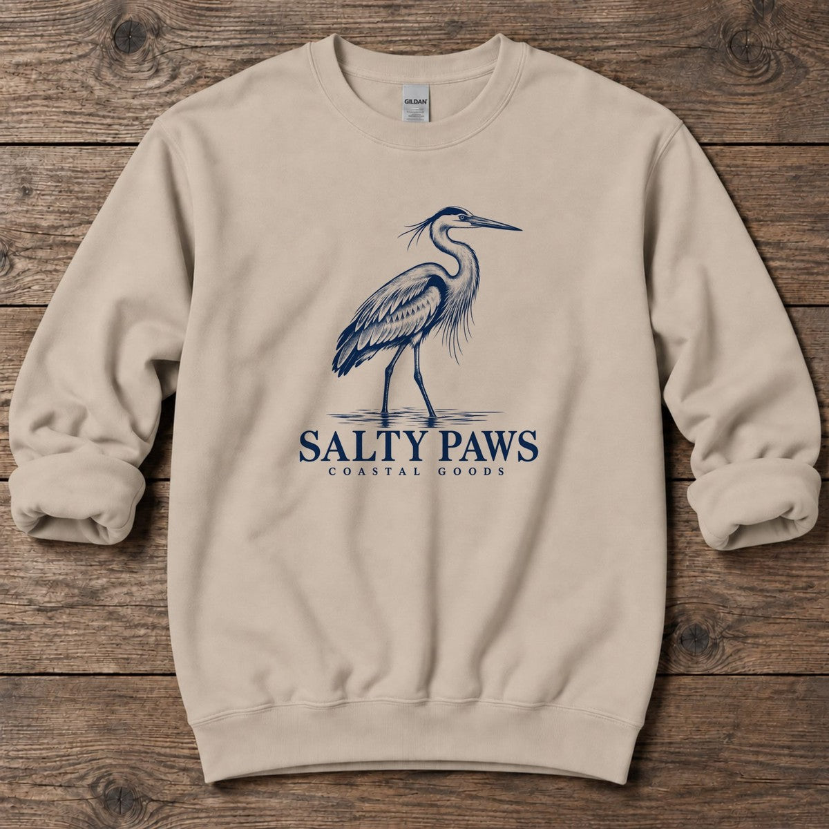 Great Blue Heron Coastal Goods Midweight Sweatshirt in Sand, Salty Paws Midweight Sweatshirt, front design flat lay