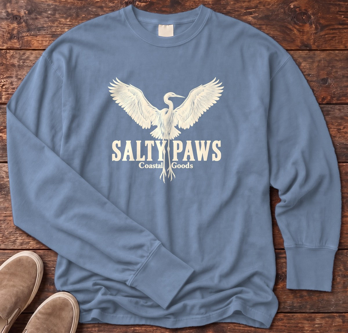 Rising Egret Salty Paws Coastal Goods Long Sleeve Tee in Blue Jean, Salty Paws Comfort Colors Long Sleeve Tee, front design flat lay