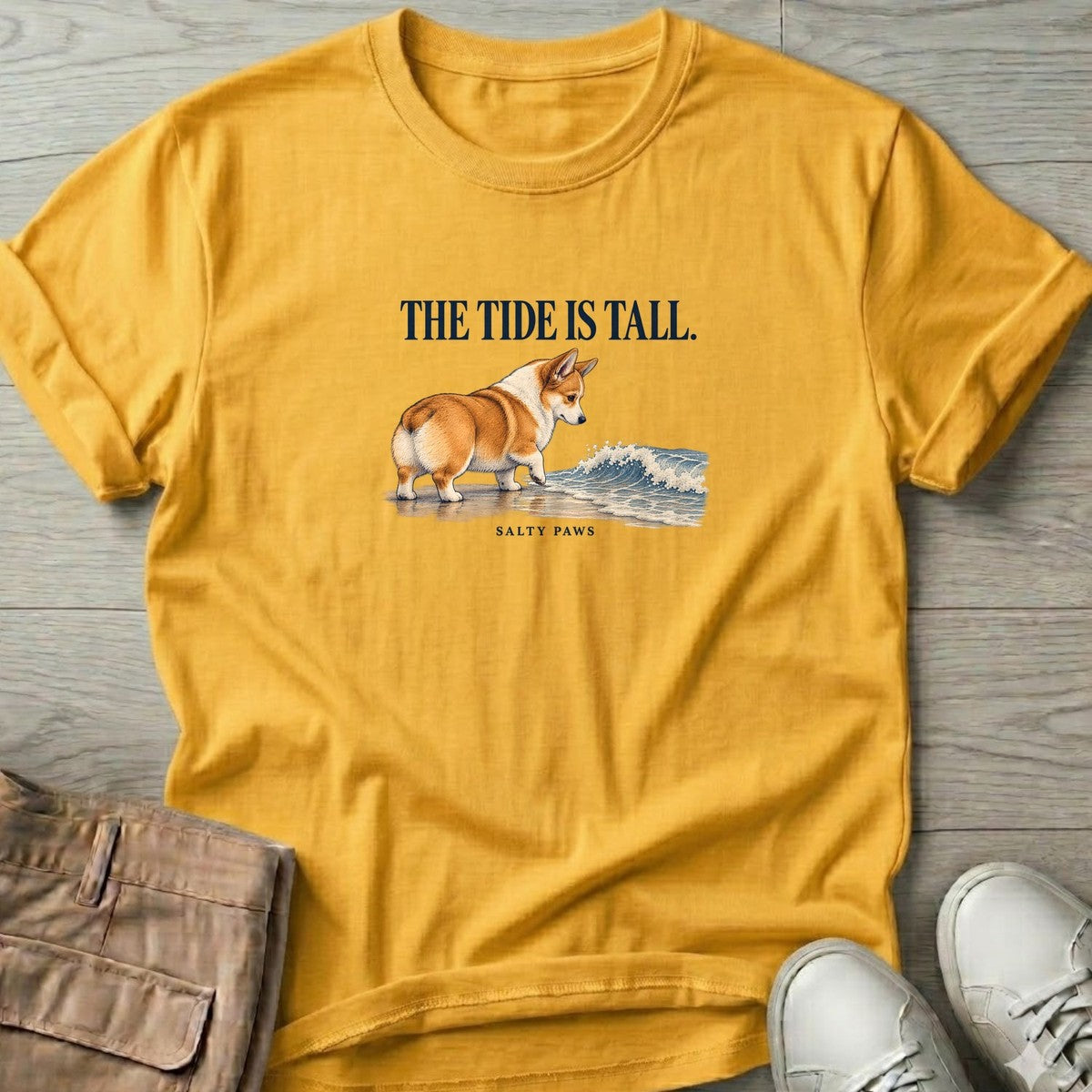 The Tide Is Tall Corgi T-Shirt in Daisy, Salty Paws T-Shirt, front design flat lay