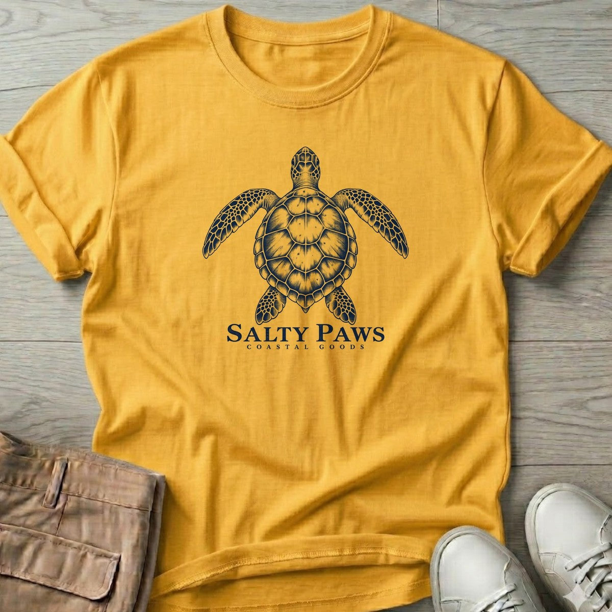 Sea Turtle Coastal Goods T-Shirt in Daisy, Salty Paws T-Shirt, front design flat lay