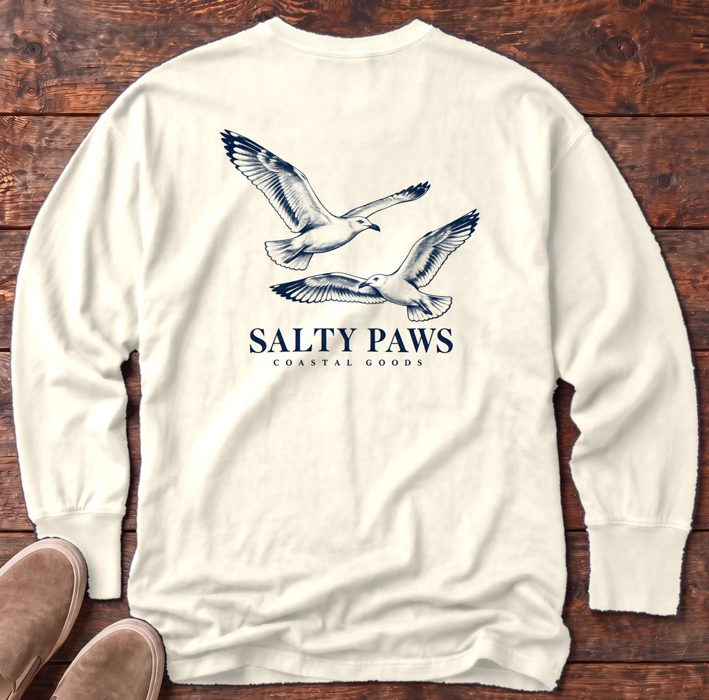 Gull Flight Coastal Goods Back Design Long Sleeve Tee in Ivory, Salty Paws Comfort Colors Long Sleeve Tee, back design flat lay