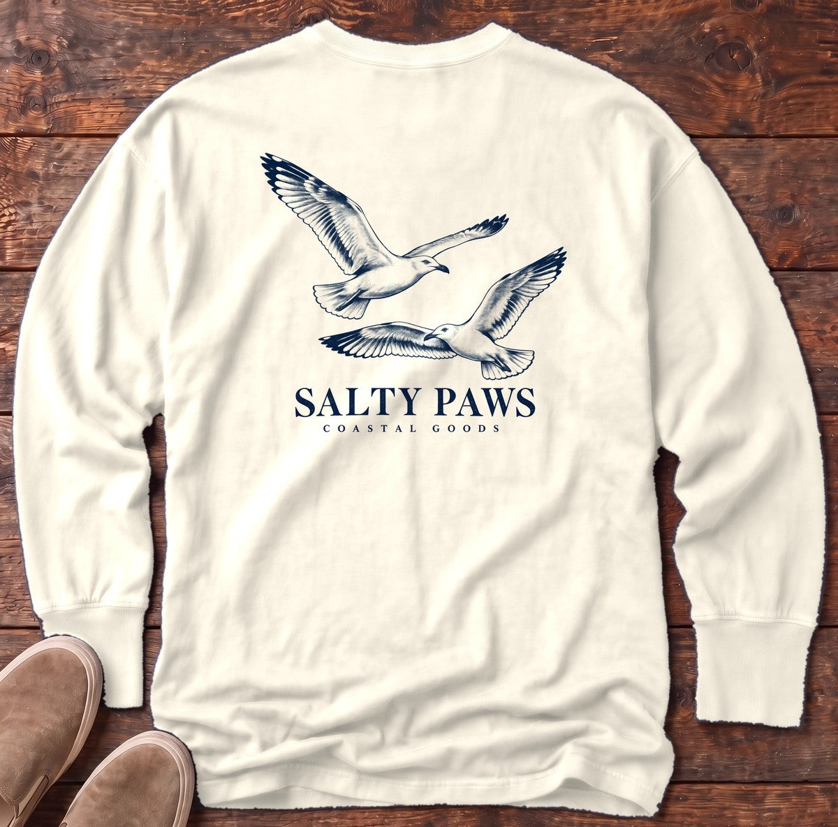 Gull Flight Coastal Goods Back Design Long Sleeve Tee in Ivory, Salty Paws Comfort Colors Long Sleeve Tee, back design flat lay