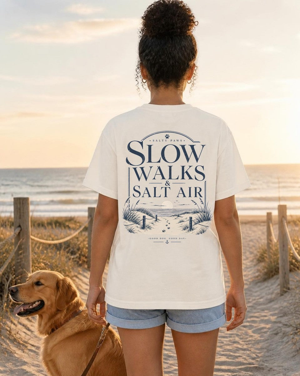 Slow Walks and Salt Air Comfort Colors T-Shirt in Ivory, worn by a model