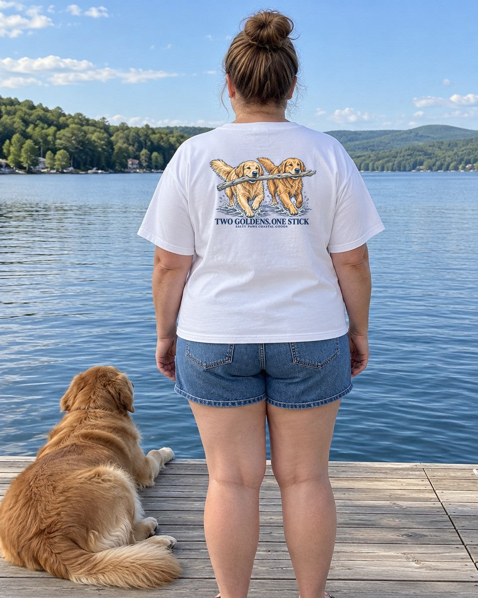Two Goldens, One Stick Back Design Comfort Colors T-Shirt in White, worn by a model