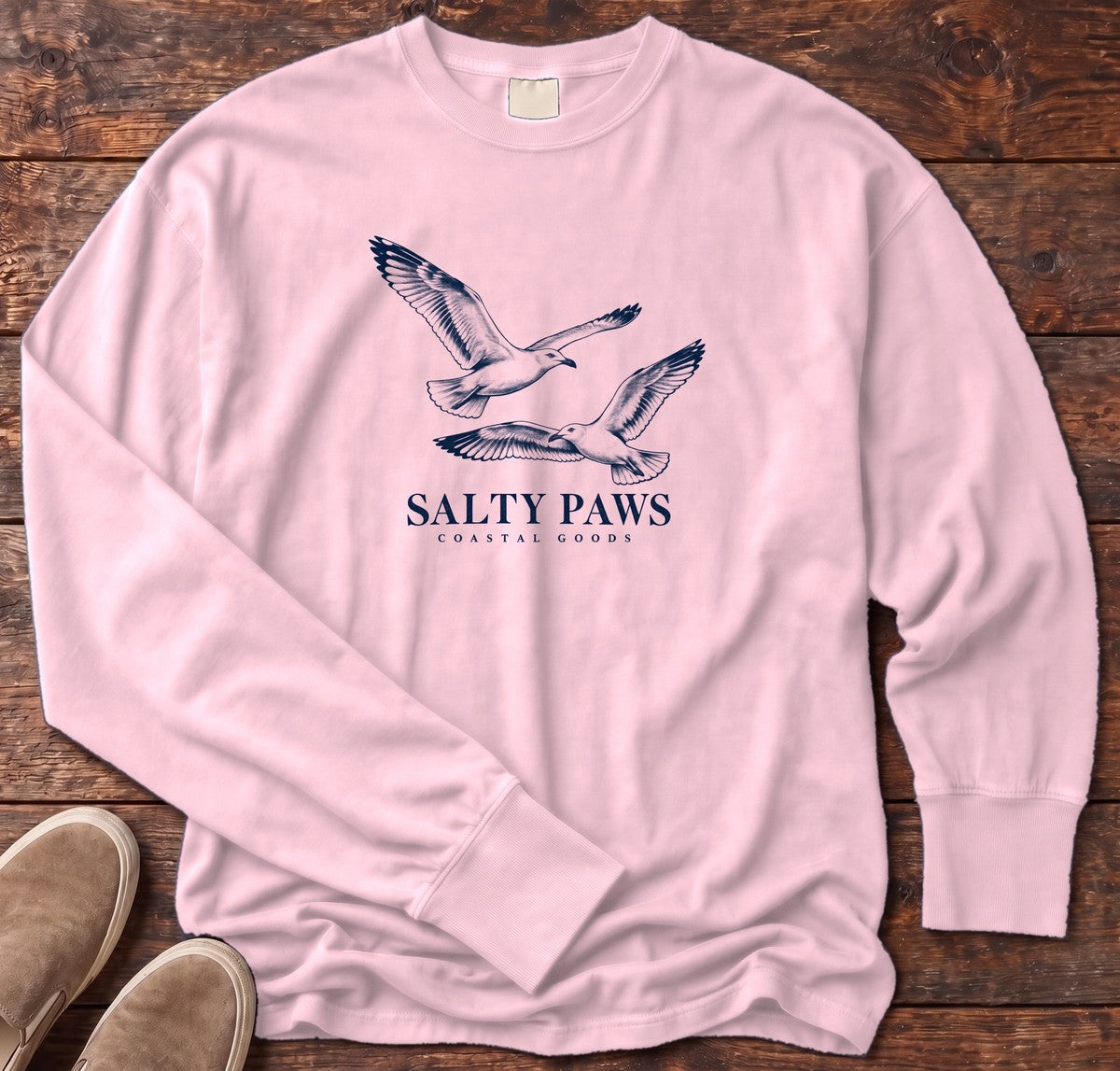 Gull Flight Coastal Goods Long Sleeve Tee in Blossom, Salty Paws Comfort Colors Long Sleeve Tee, front design flat lay