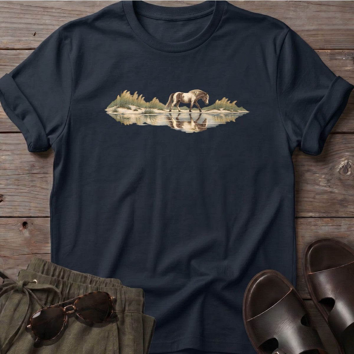 Assateague Pony T-Shirt in Black, Salty Paws T-Shirt, front design flat lay