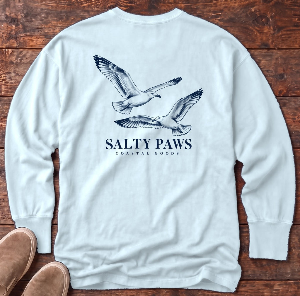 Gull Flight Coastal Goods Back Design Long Sleeve Tee in Chambray, Salty Paws Comfort Colors Long Sleeve Tee, back design flat lay