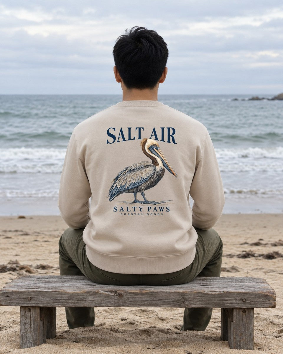 Salt Air Pelican Salty Paws Coastal Goods Back Design Midweight Sweatshirt in Sand worn by a model, Salty Paws Midweight Sweatshirt