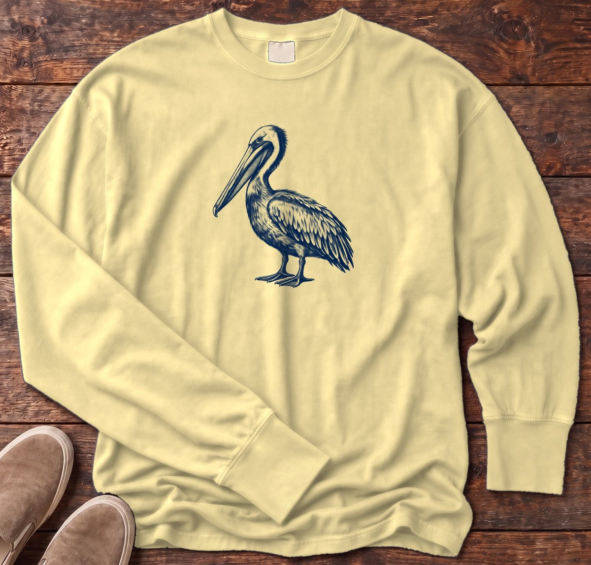 Navy Pelican Portrait Long Sleeve Tee in Butter, Salty Paws Comfort Colors Long Sleeve Tee, front design flat lay