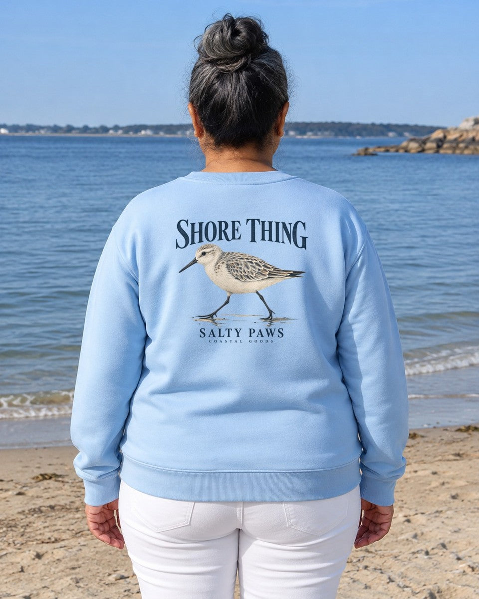 Shore Thing Sandpiper Salty Paws Coastal Goods Back Design Midweight Sweatshirt in Sky worn by a model, Salty Paws Midweight Sweatshirt
