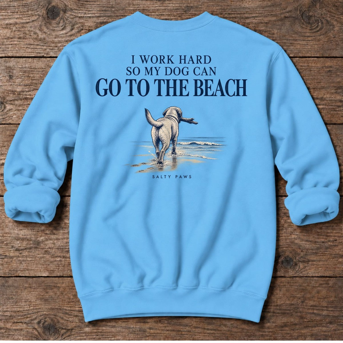 I Work Hard So My Dog Can Go to the Beach Back Design Midweight Sweatshirt in Sky, Salty Paws Midweight Sweatshirt, back design flat lay