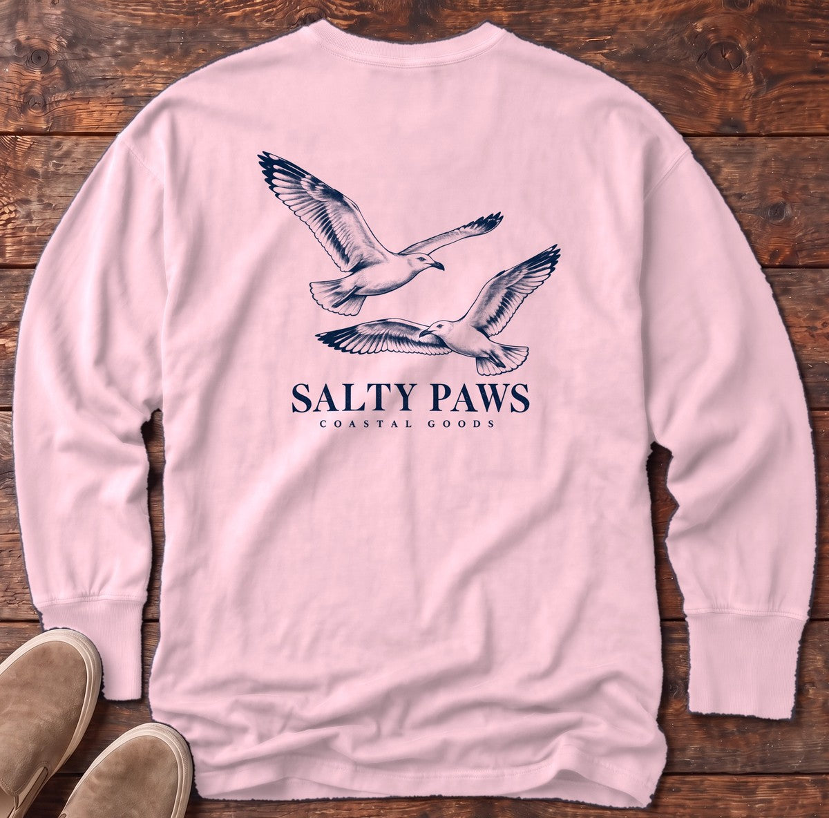 Gull Flight Coastal Goods Back Design Long Sleeve Tee in Blossom, Salty Paws Comfort Colors Long Sleeve Tee, back design flat lay