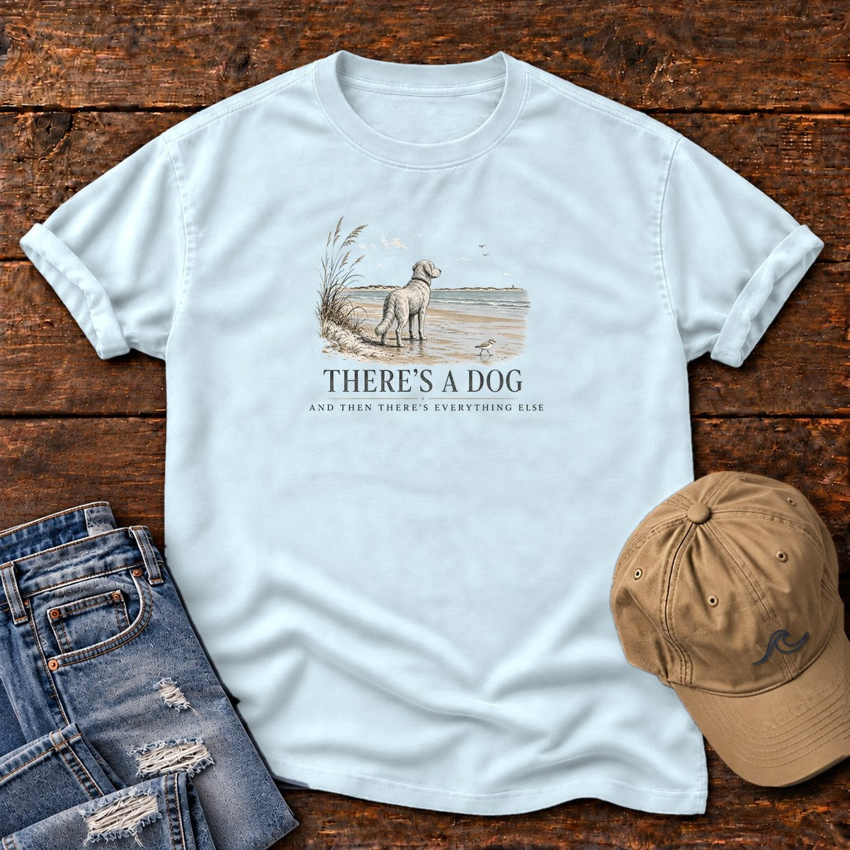 There's a Dog and Everything Else Comfort Colors T-Shirt in Chambray, front design flat lay