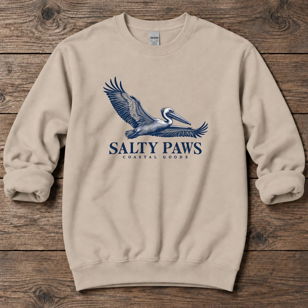 Gliding Pelican Coastal Goods Midweight Sweatshirt in Sand, Salty Paws Midweight Sweatshirt, front design flat lay