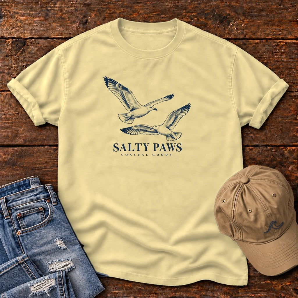Gull Flight Coastal Goods T-Shirt in Butter, Salty Paws Comfort Colors T-Shirt, front design flat lay