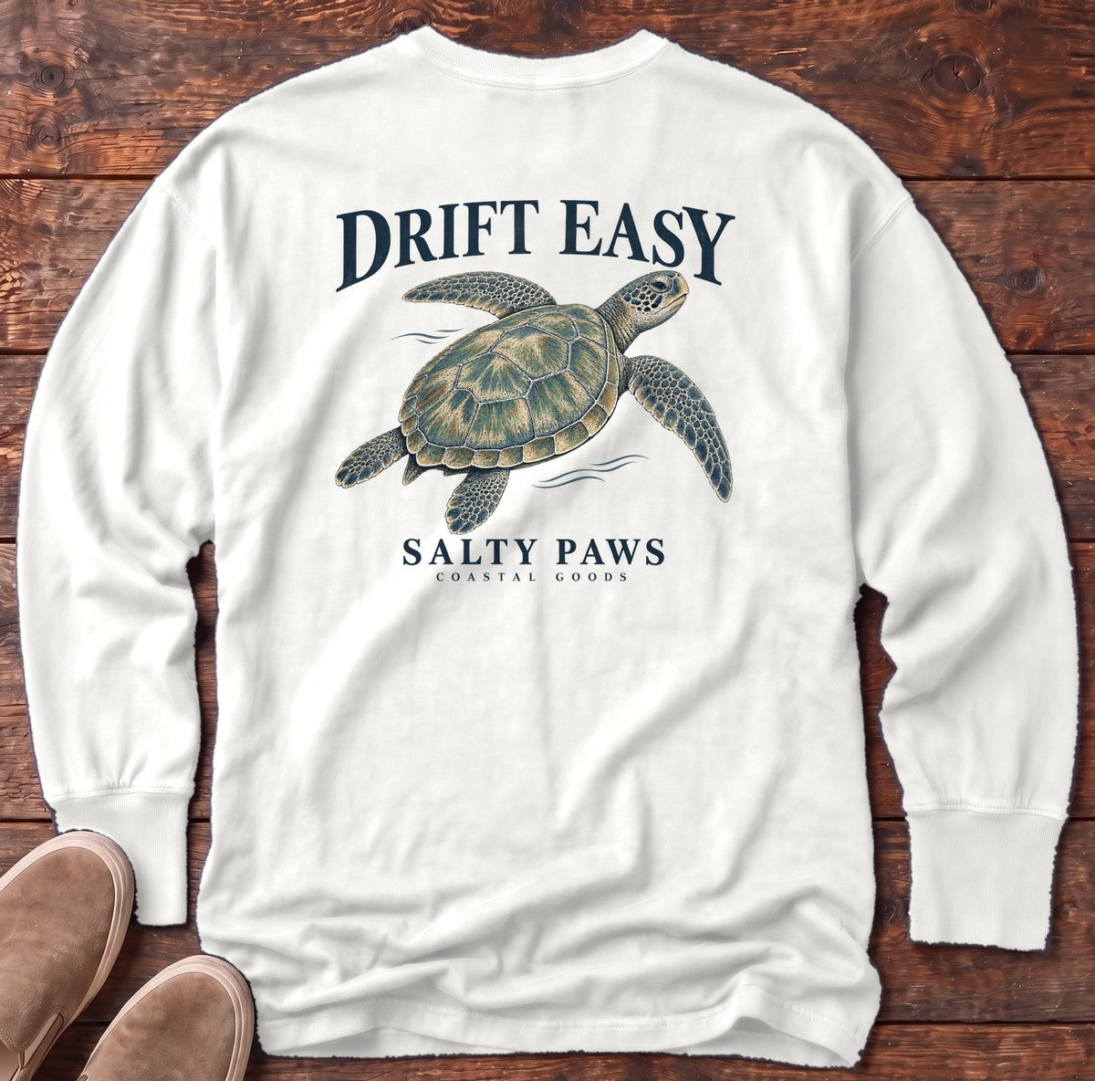 Drift Easy Sea Turtle Salty Paws Coastal Goods Back Design Long Sleeve Tee in White, Salty Paws Comfort Colors Long Sleeve Tee, back design flat lay