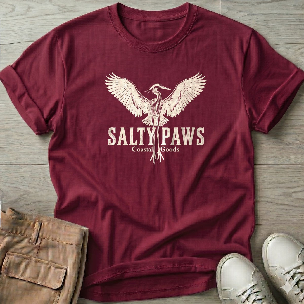Rising Heron Salty Paws Coastal Goods T-Shirt in Maroon, Salty Paws T-Shirt, front design flat lay