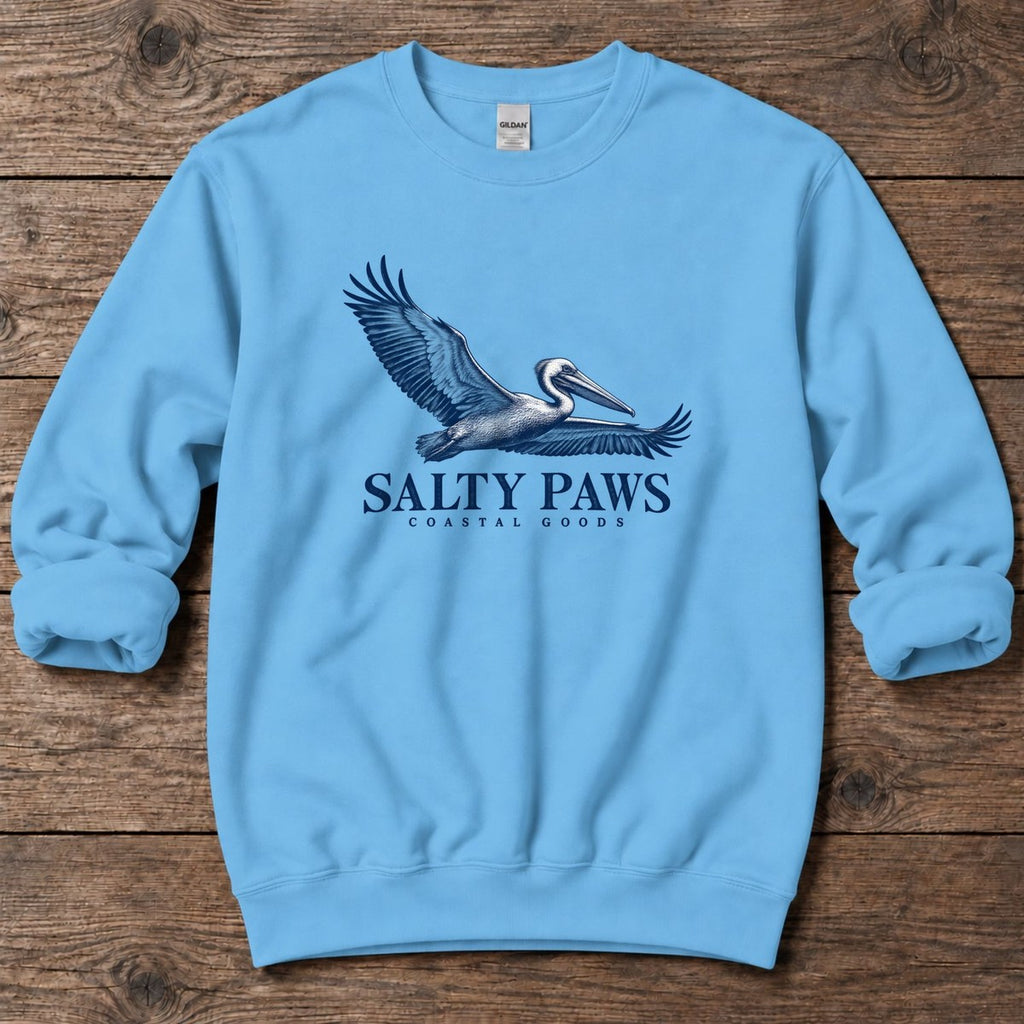 Gliding Pelican Coastal Goods Midweight Sweatshirt in Sky, Salty Paws Midweight Sweatshirt, front design flat lay