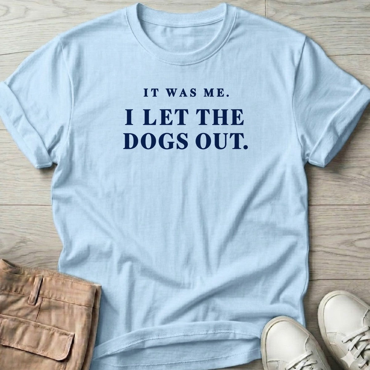 It Was Me I Let the Dogs Out T-Shirt in Light Blue, Salty Paws T-Shirt, front design flat lay