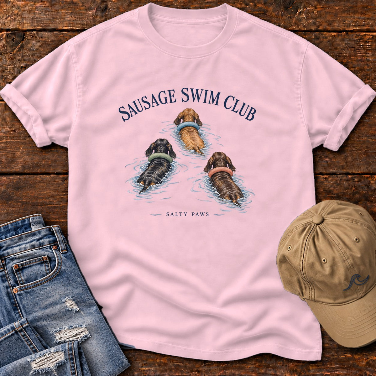 Sausage Swim Club Dachshund Trio T-Shirt in Blossom, Salty Paws Comfort Colors T-Shirt, front design flat lay