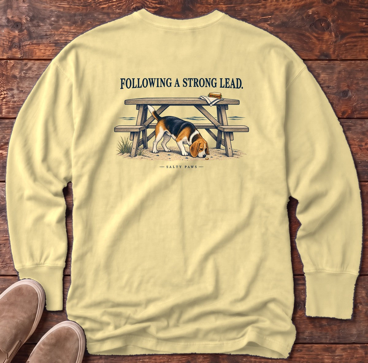 Following a Strong Lead Beagle Back Design Long Sleeve Tee in Butter, Salty Paws Comfort Colors Long Sleeve Tee, back design flat lay