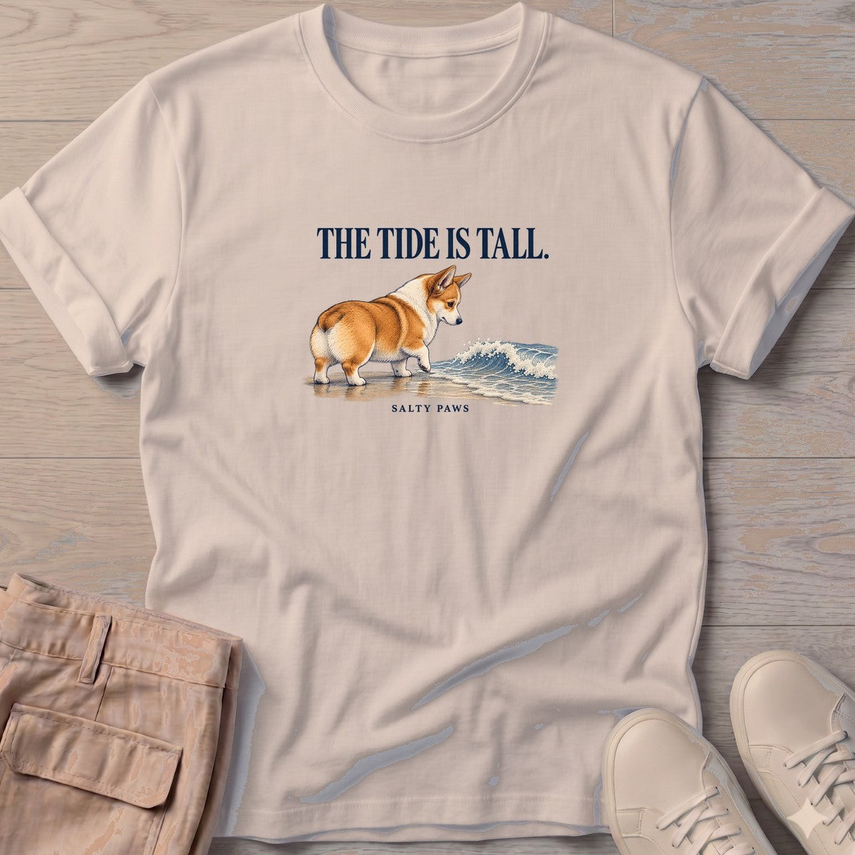 The Tide Is Tall Corgi T-Shirt in Sand, Salty Paws T-Shirt, front design flat lay