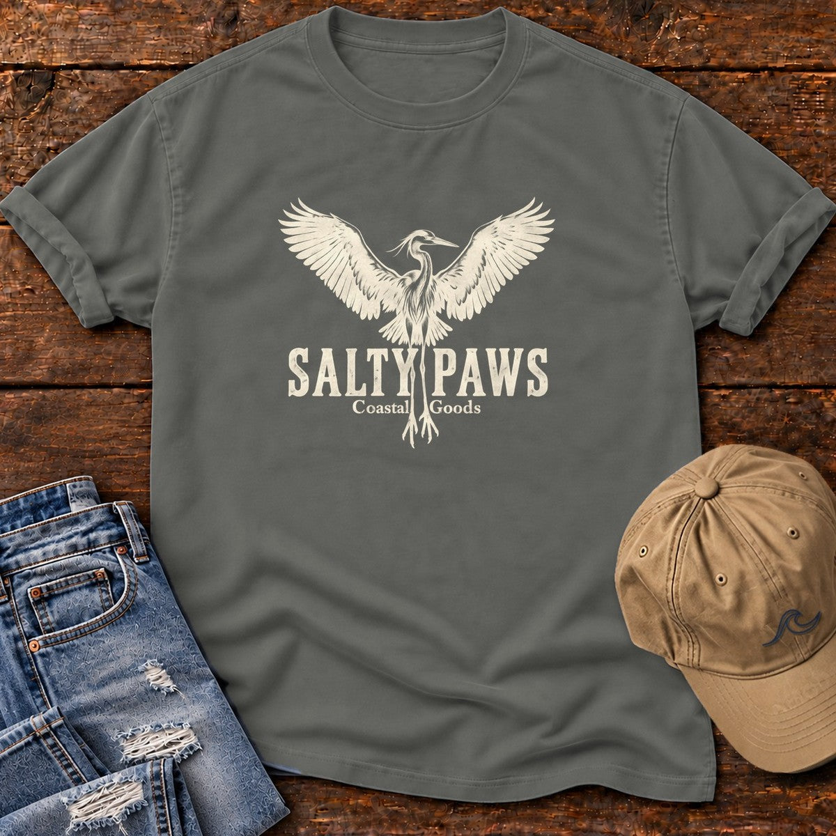 Rising Heron Salty Paws Coastal Goods T-Shirt in Pepper, Salty Paws Comfort Colors T-Shirt, front design flat lay