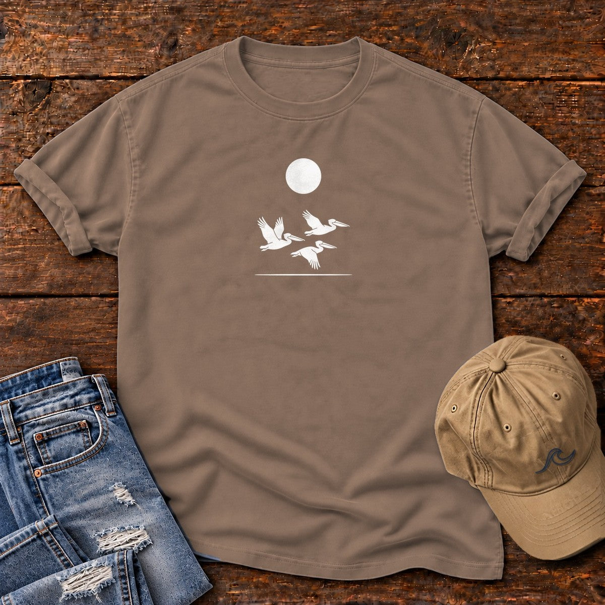 3 Pelicans Comfort Colors T-Shirt in Espresso, front design flat lay