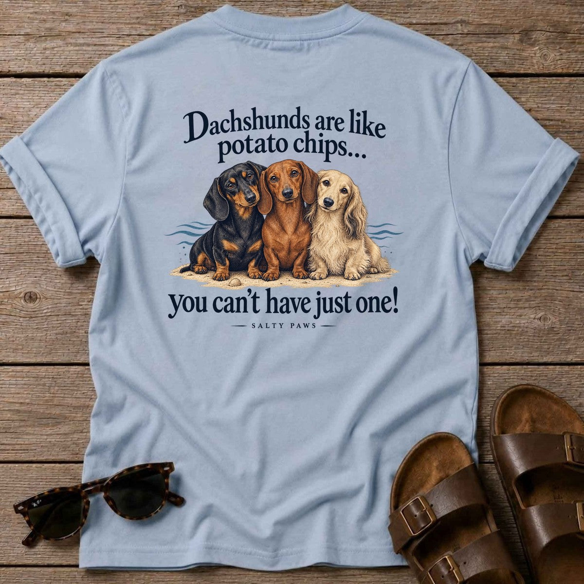 Dachshunds Are Like Potato Chips Back Design T-Shirt in Light Blue, Salty Paws T-Shirt, back design flat lay