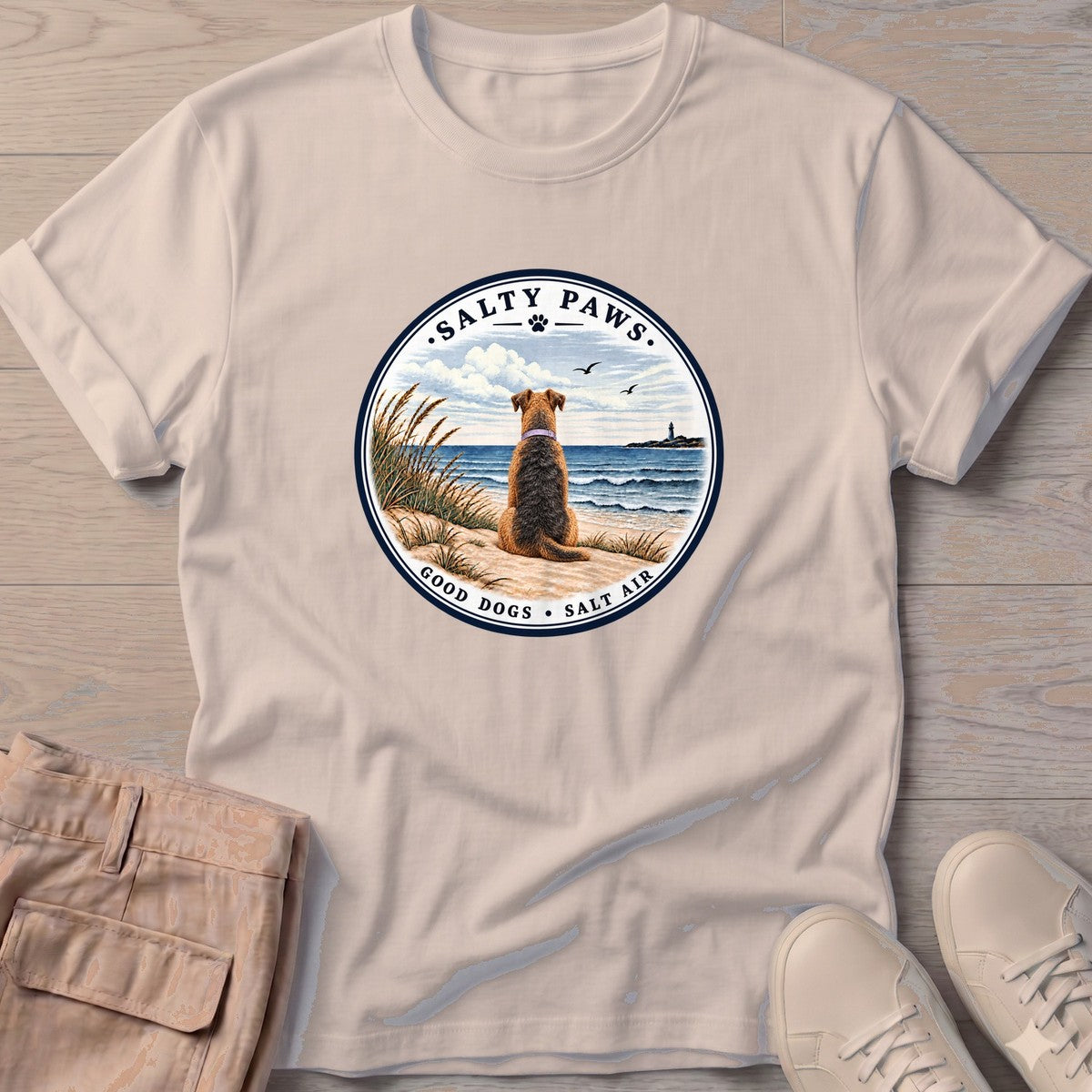 Good Dogs Salt Air Airedale T-Shirt in Sand, Salty Paws T-Shirt, front design flat lay