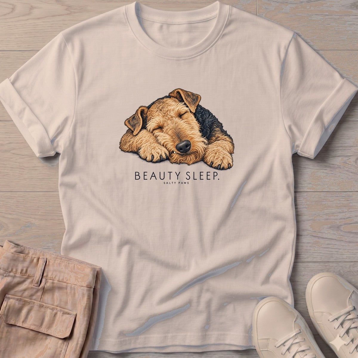 Beauty Sleep Airedale Terrier T-Shirt in Sand, Salty Paws T-Shirt, front design flat lay