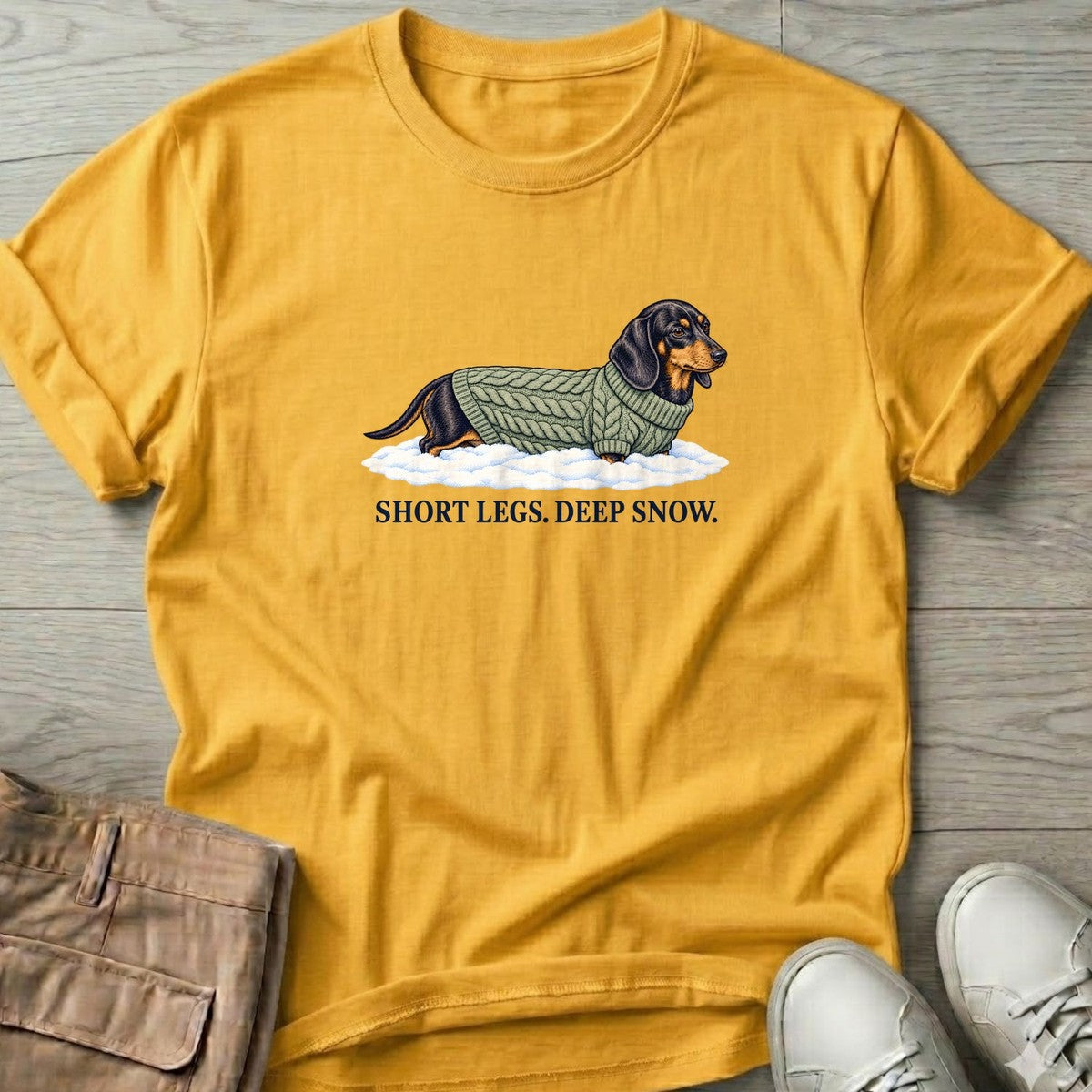 Short Legs Deep Snow Dachshund T-Shirt in Daisy, Salty Paws T-Shirt, front design flat lay
