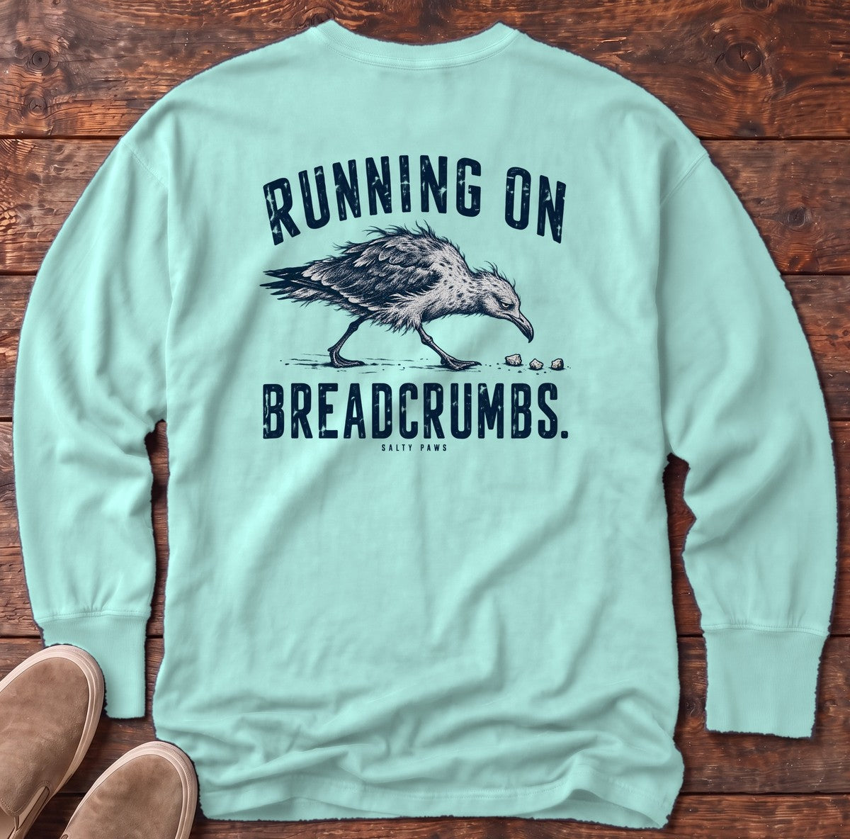 Running on Breadcrumbs Seagull Back Design Long Sleeve Tee in Chalky Mint, Salty Paws Comfort Colors Long Sleeve Tee, back design flat lay