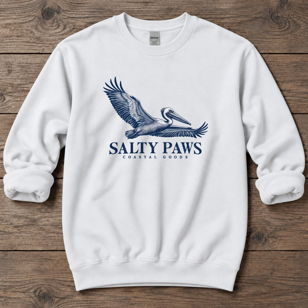 Gliding Pelican Coastal Goods Midweight Sweatshirt in White, Salty Paws Midweight Sweatshirt, front design flat lay