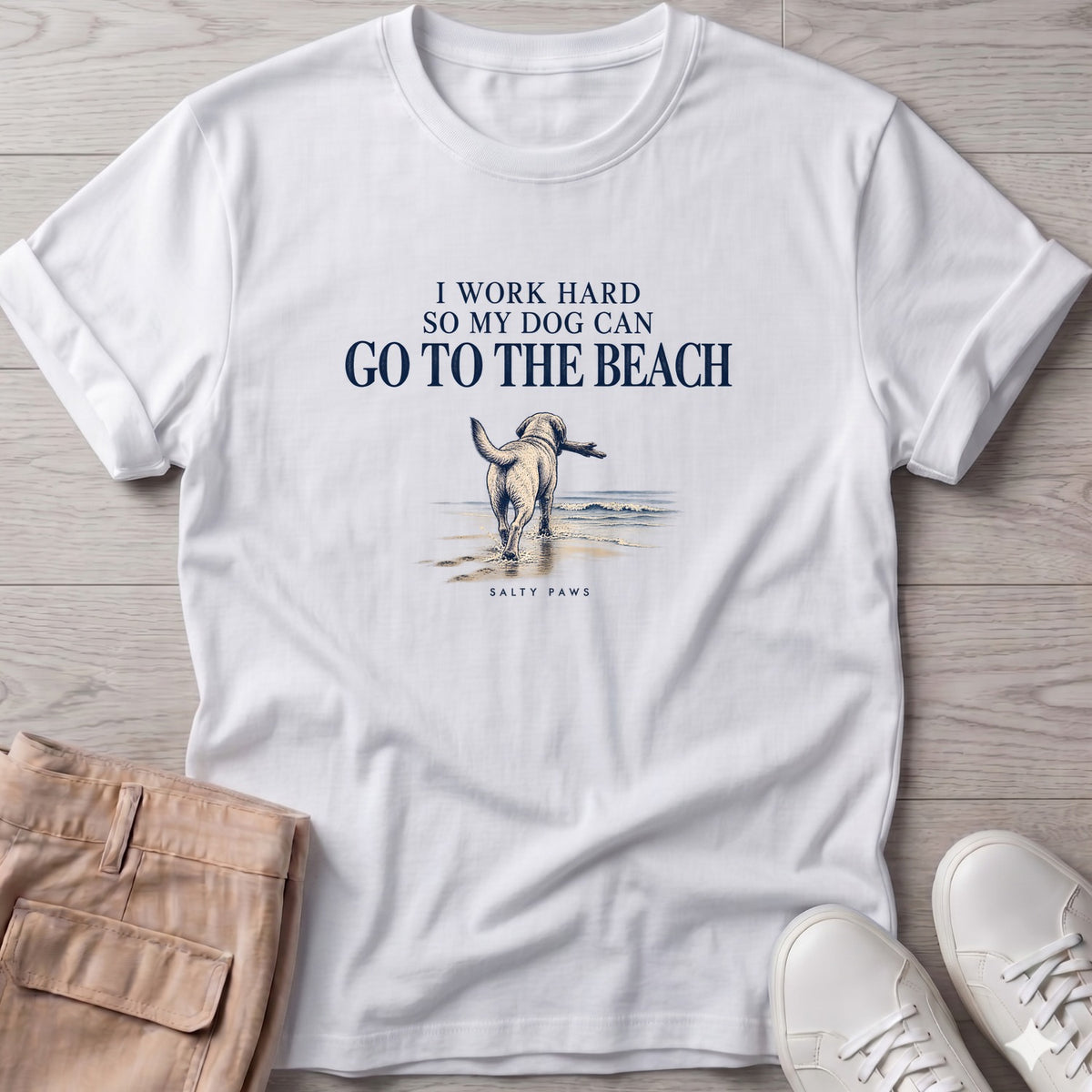 I Work Hard So My Dog Can Go to the Beach T-Shirt in White, Salty Paws T-Shirt, front design flat lay