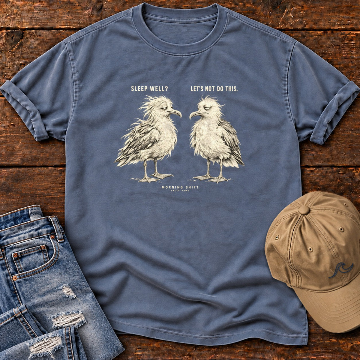 Sleep Well Let's Not Do This Seagulls T-Shirt in Blue Jean, Salty Paws Comfort Colors T-Shirt, front design flat lay