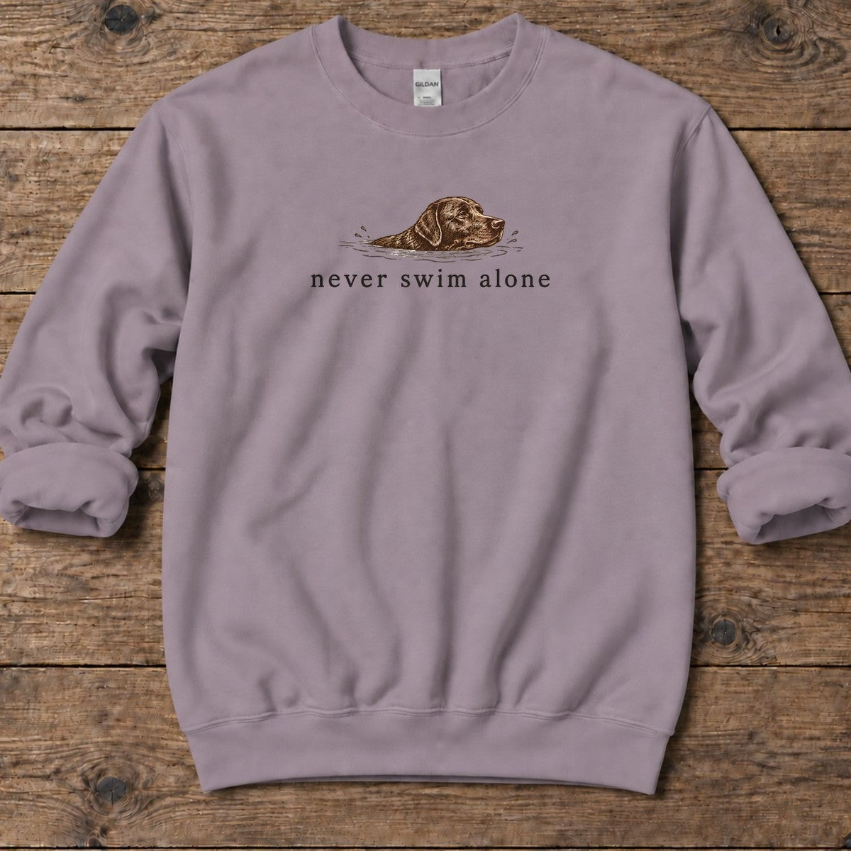 Never Swim Alone Chocolate Lab Midweight Sweatshirt in Paragon, front design flat lay