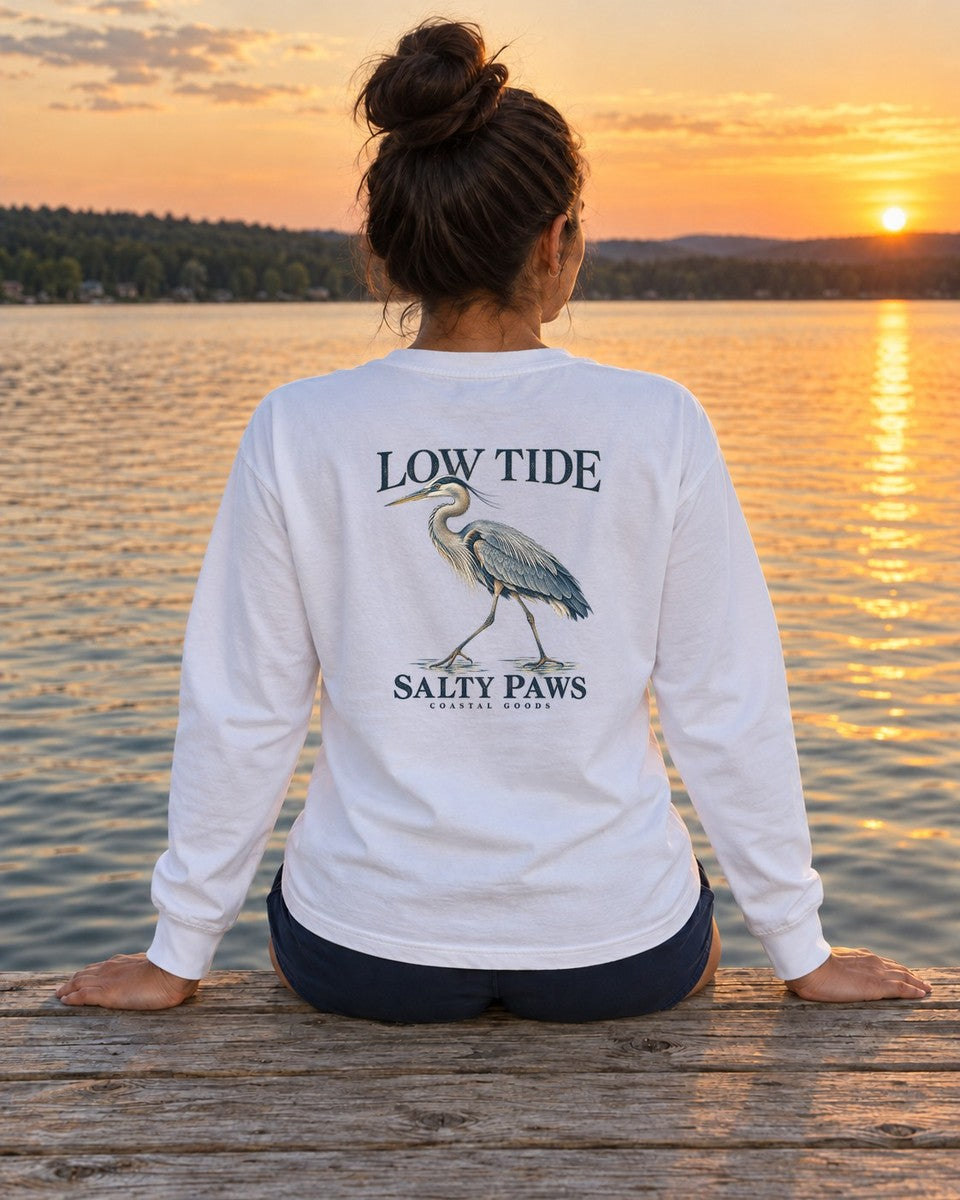 Low Tide Heron Salty Paws Coastal Goods Back Design Long Sleeve Tee in White worn by a model, Salty Paws Comfort Colors Long Sleeve Tee