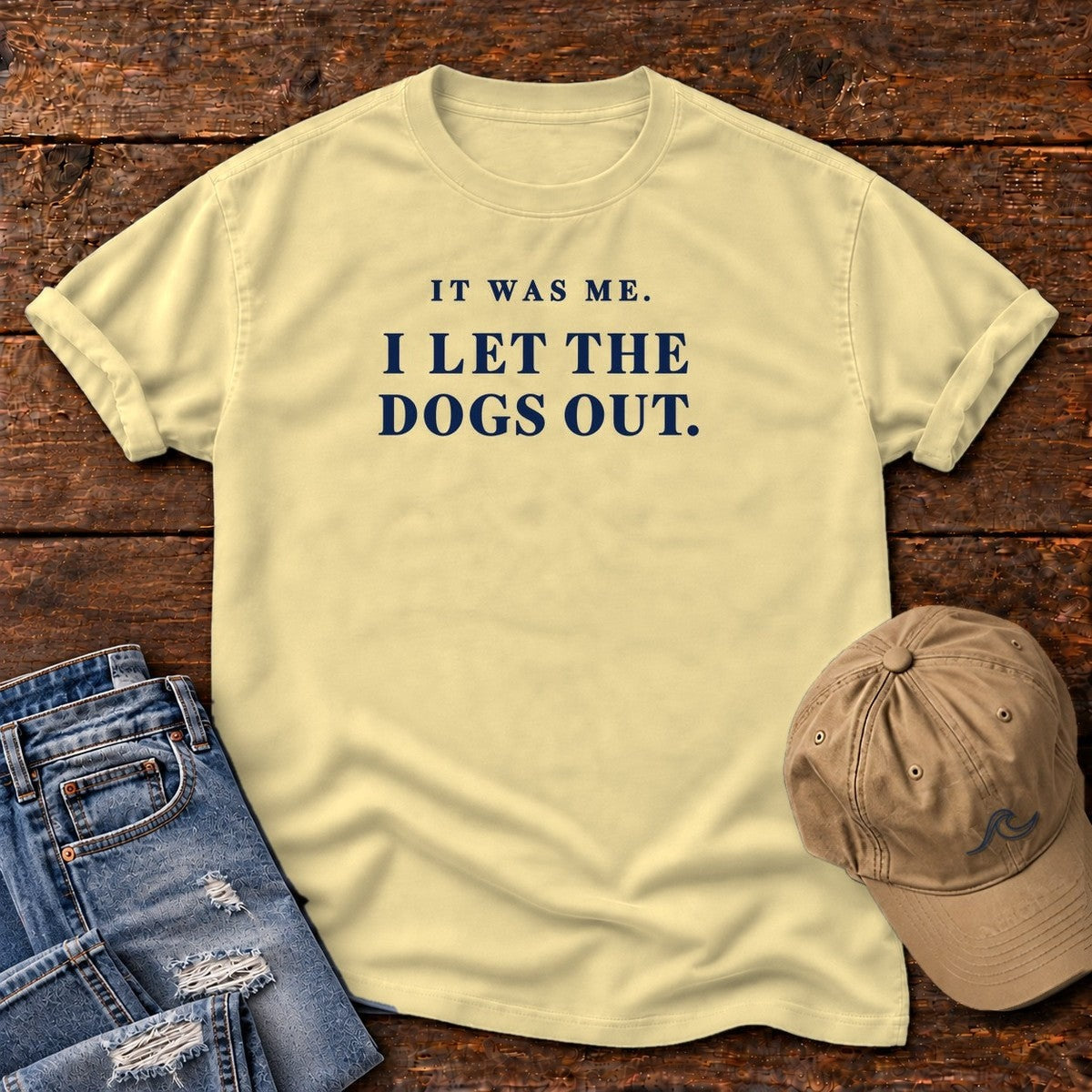 It Was Me I Let the Dogs Out T-Shirt in Butter, Salty Paws Comfort Colors T-Shirt, front design flat lay