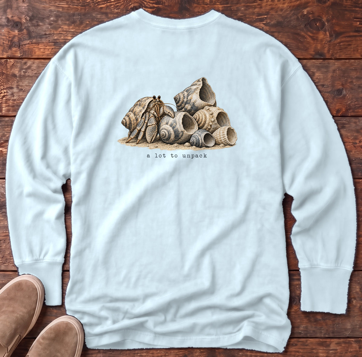 A Lot to Unpack Hermit Crab Back Design Long Sleeve Tee Comfort Colors in Chambray, Salty Paws Comfort Colors Long Sleeve Tee, back design flat lay