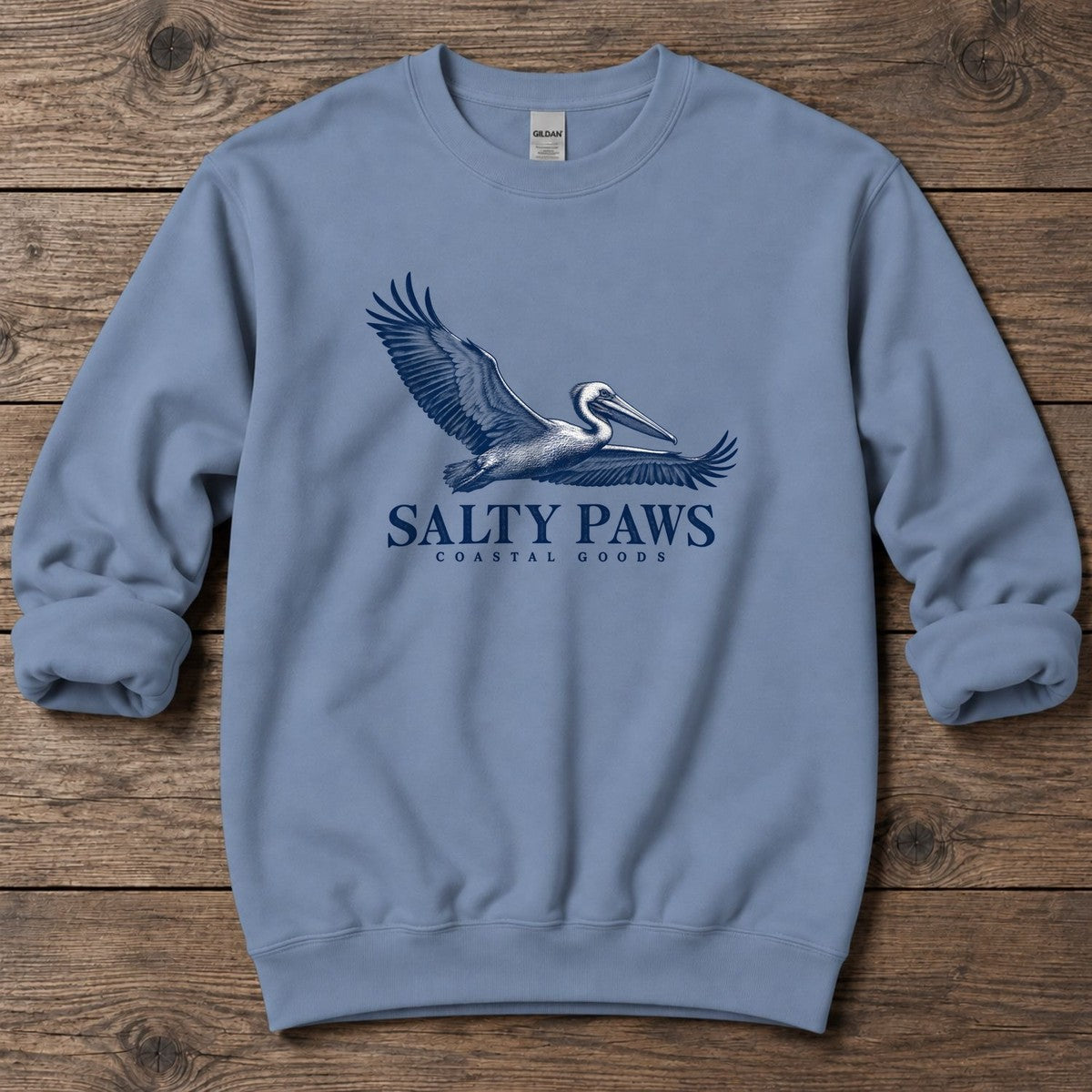 Gliding Pelican Coastal Goods Midweight Sweatshirt in Stone Blue, Salty Paws Midweight Sweatshirt, front design flat lay