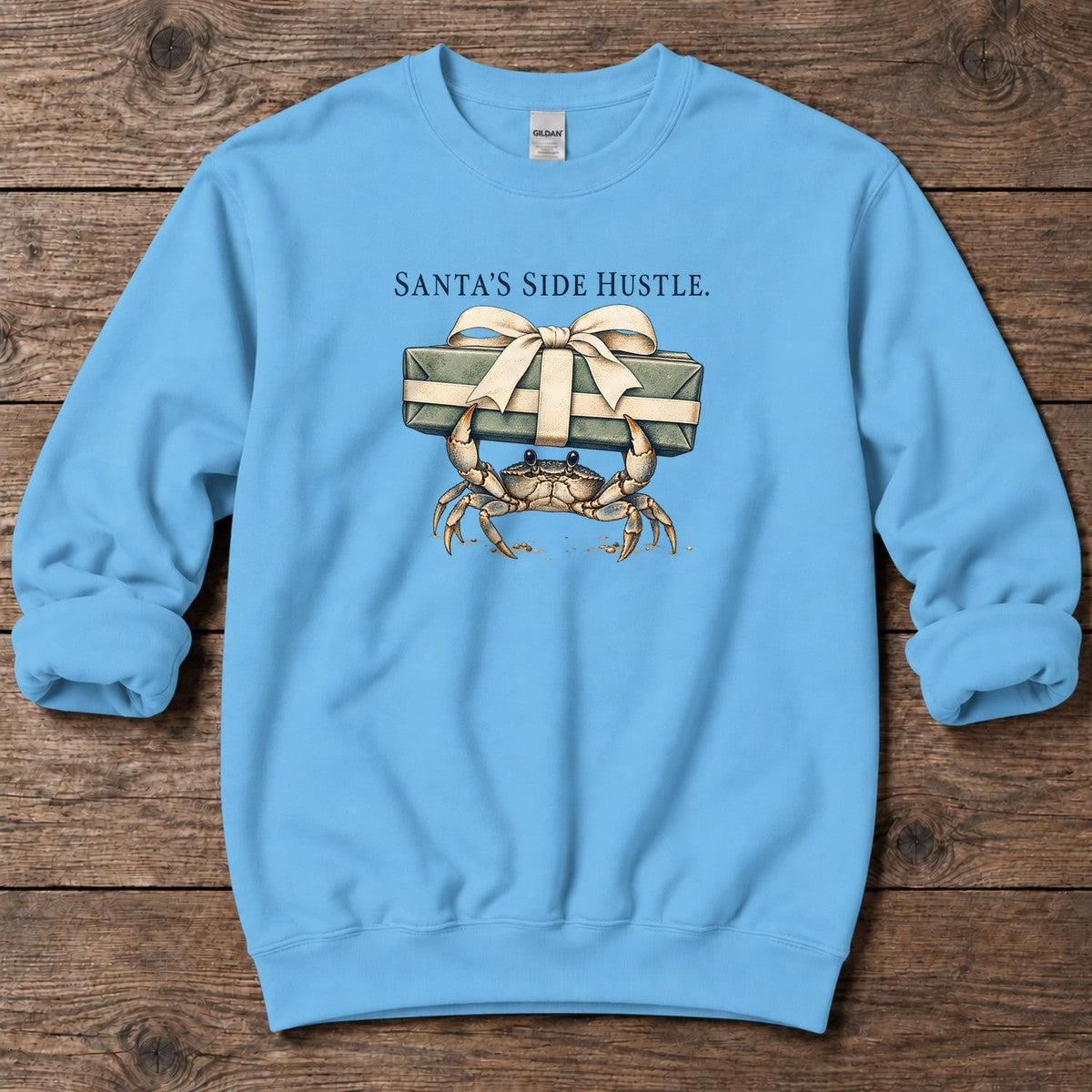 Santa's Side Hustle Crab Midweight Sweatshirt in Sky, Salty Paws Midweight Sweatshirt, front design flat lay
