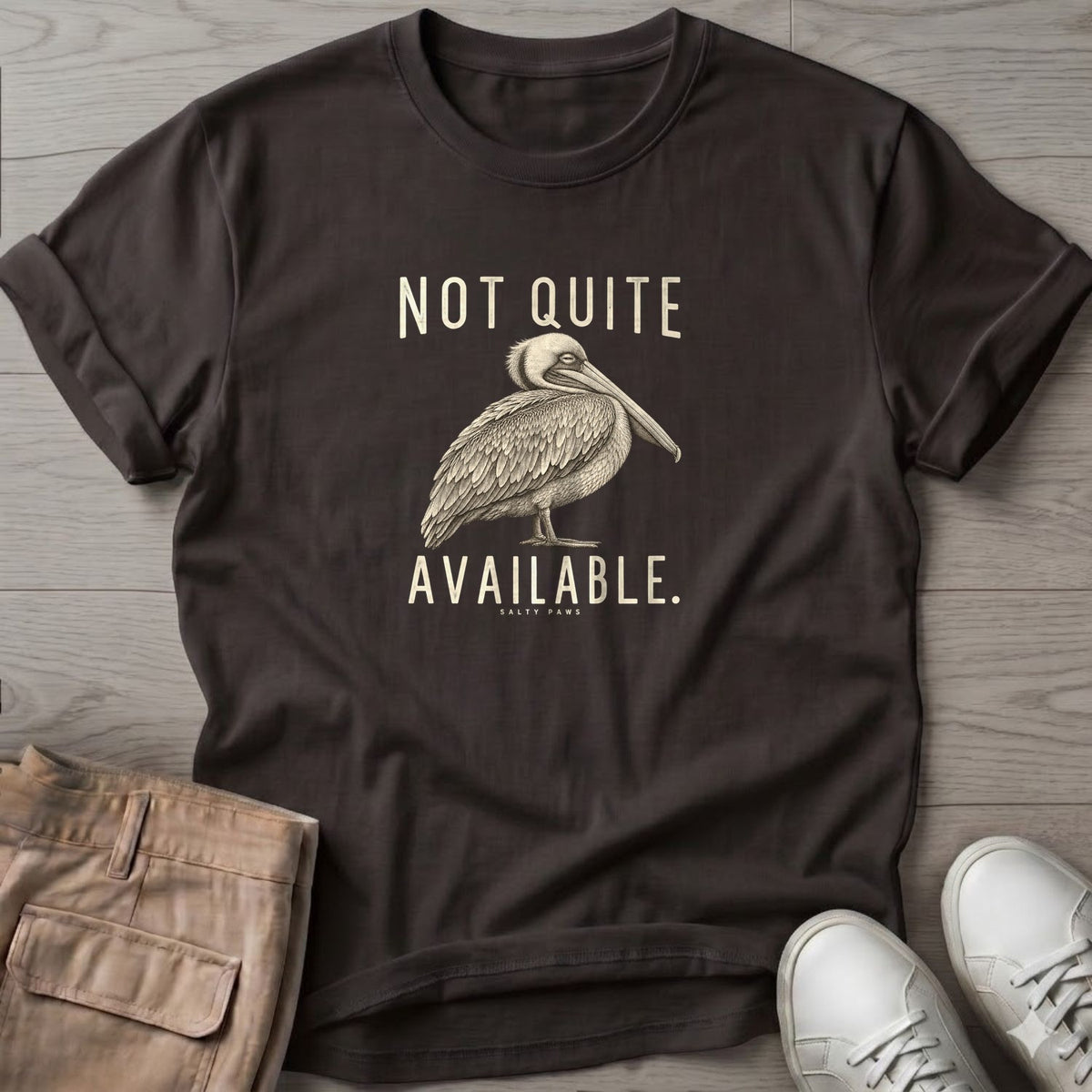 Not Quite Available Pelican T-Shirt in Dark Chocolate, Salty Paws T-Shirt, front design flat lay