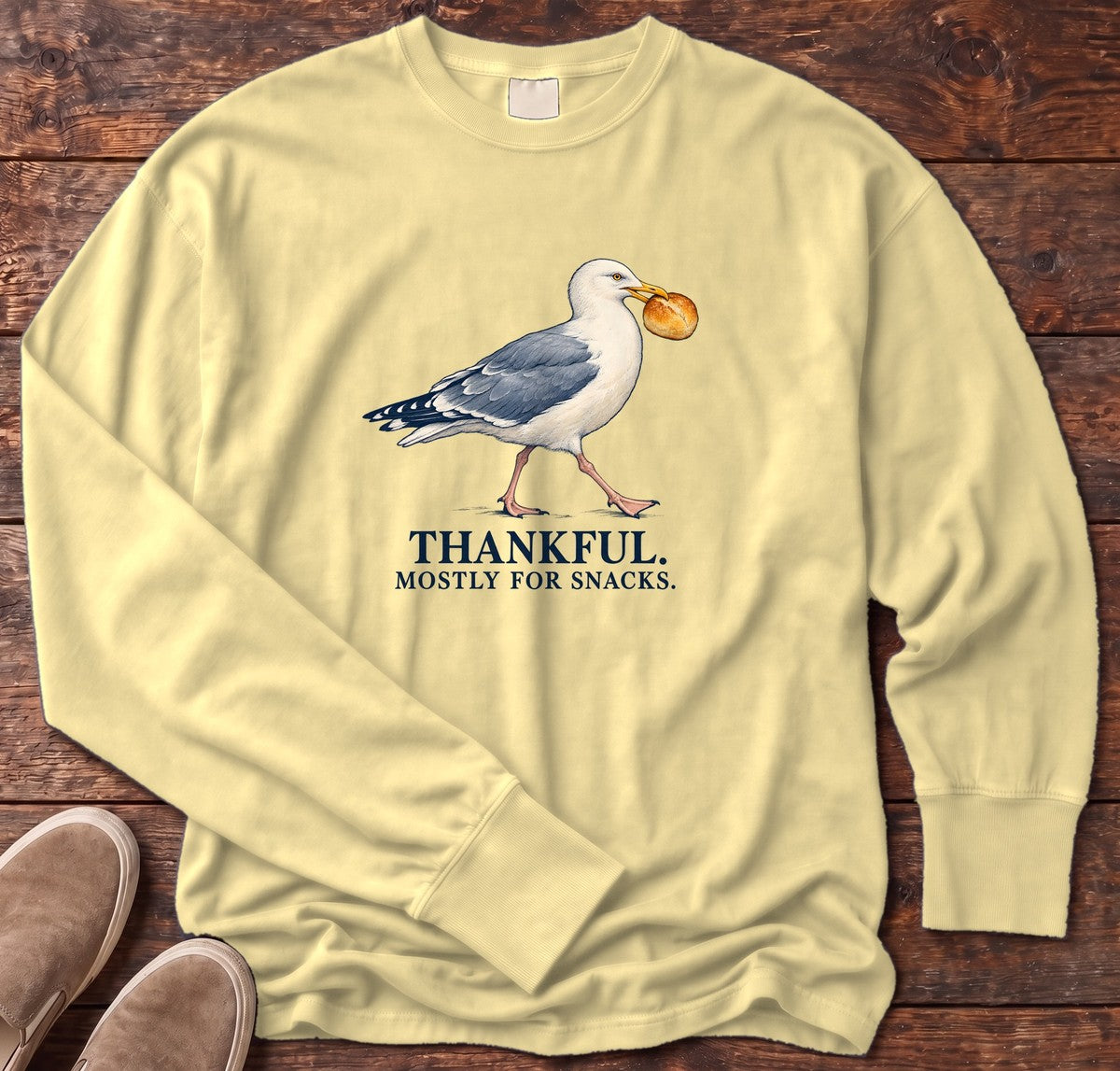 Thankful Mostly for Snacks Seagull Long Sleeve Tee in Butter, Salty Paws Comfort Colors Long Sleeve Tee, front design flat lay