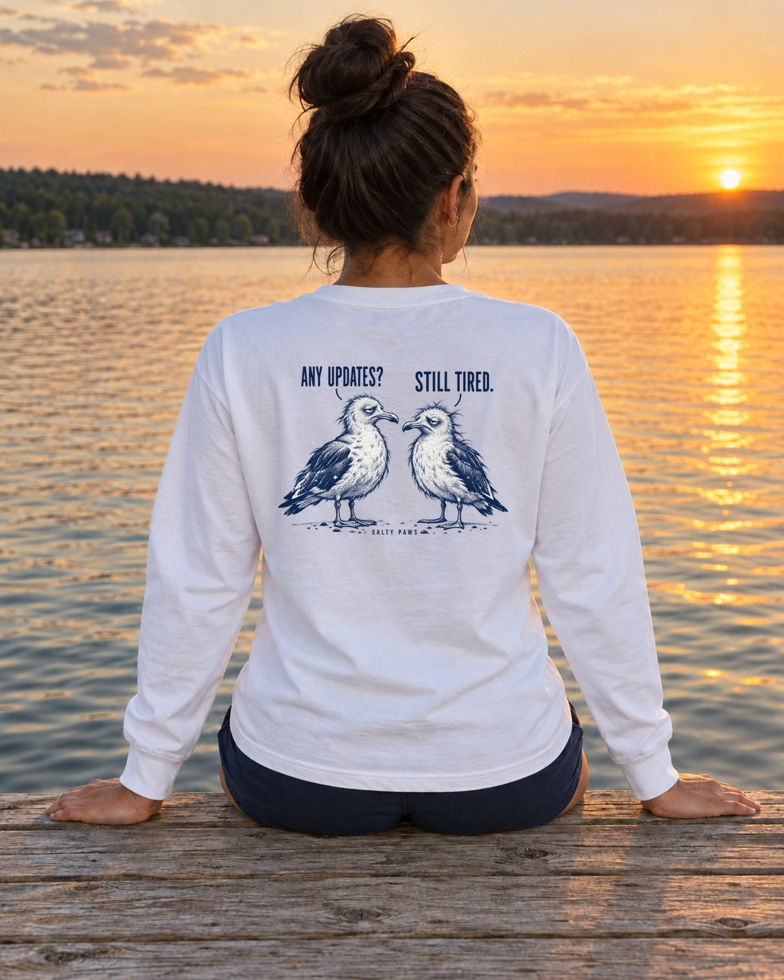 Any Updates Still Tired Seagulls Back Design Long Sleeve Tee in White, worn by a model, Salty Paws back design