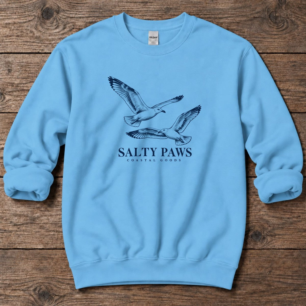 Gull Flight Coastal Goods Midweight Sweatshirt in Sky, Salty Paws Midweight Sweatshirt, front design flat lay