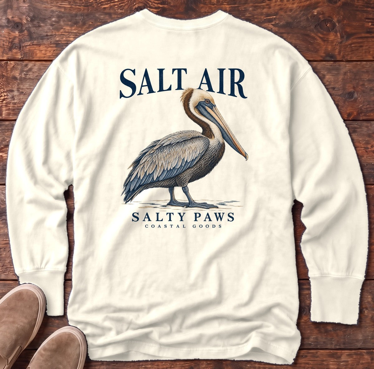 Salt Air Pelican Salty Paws Coastal Goods Back Design Long Sleeve Tee in Ivory, Salty Paws Comfort Colors Long Sleeve Tee, back design flat lay