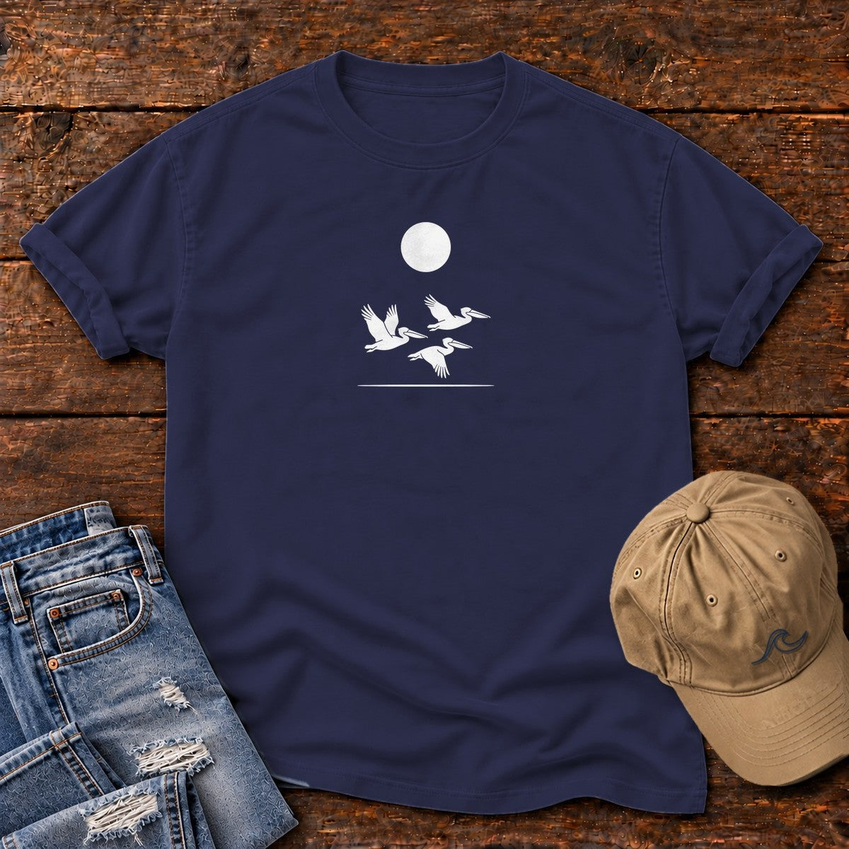3 Pelicans Comfort Colors T-Shirt in True Navy, front design flat lay