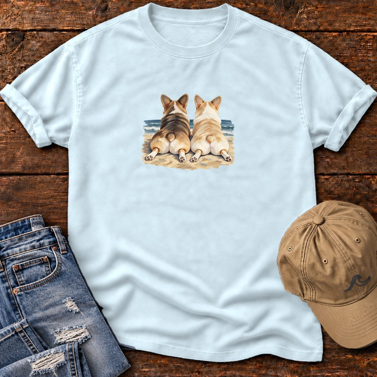 Two Corgis at the Ocean T-Shirt in Chambray, Salty Paws Comfort Colors T-Shirt, front design flat lay