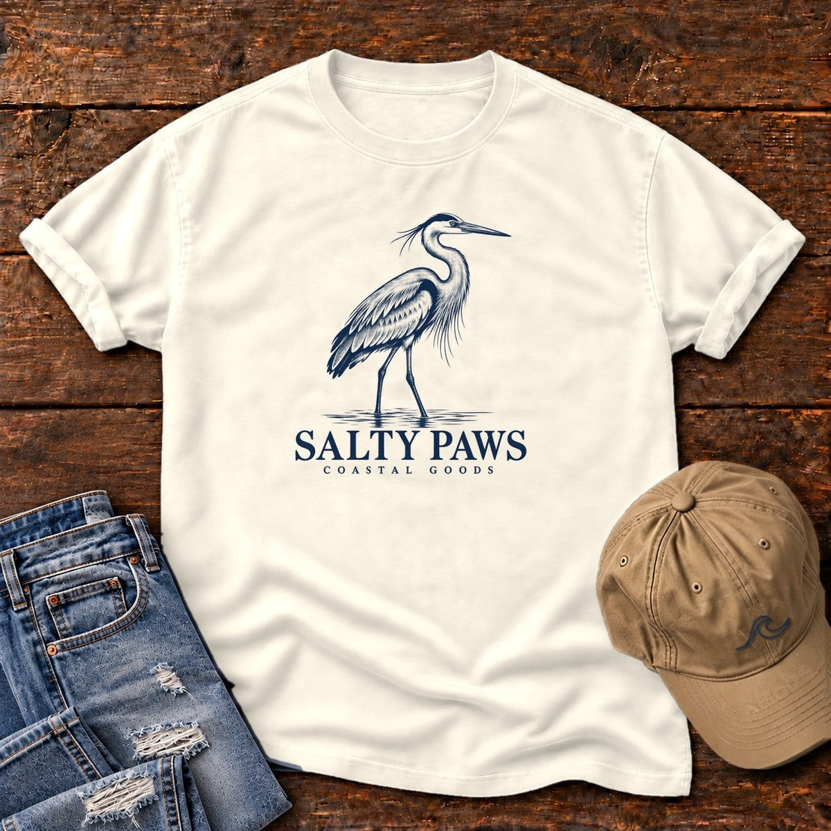 Great Blue Heron Coastal Goods T-Shirt in Ivory, Salty Paws Comfort Colors T-Shirt, front design flat lay